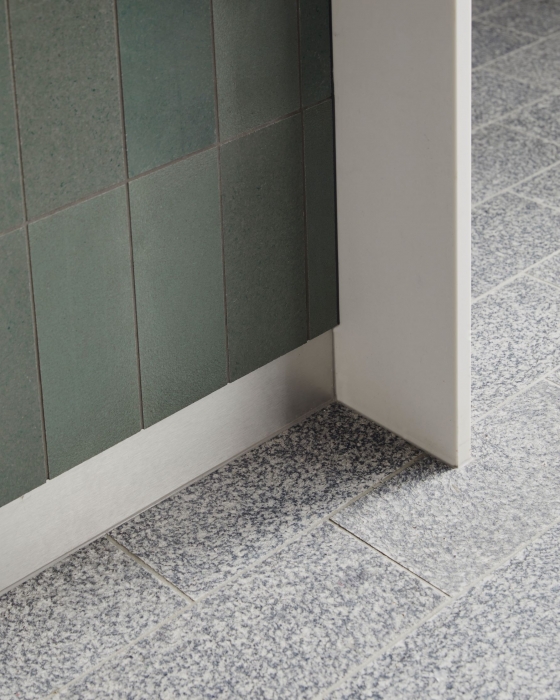 Floor tile detail and island bench wall tiles